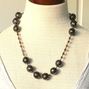 Lightweight metal etched beaded necklace